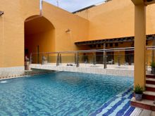 Pool on both sides of the walkway