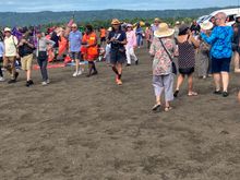 Tour groups at the hot springs.  Local market off to the side
