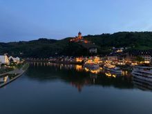 View of Cochem and its castle from the bridge at dusk