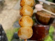 Mitarashi dango are grilled rice dumplings on a skewer, glazed in sweet soy