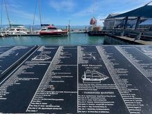 Plaques at the seafront with the names of immigrant ships and their manifests