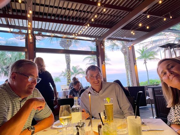 A lovely dinner and a sunset in the background. 