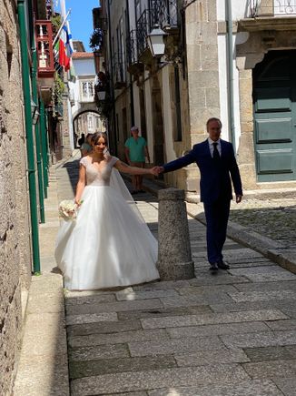 Papa leading his lovely daughter down the street