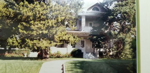 There is a lot of work to an old home  on a half acre of land.