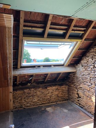 Here’s another shot for context.  This is going to be the bathroom, with the tub just below the window. This is under the roof, which is on the US second floor (French 1st floor).  The stone walls are exposed downstairs which we love. 