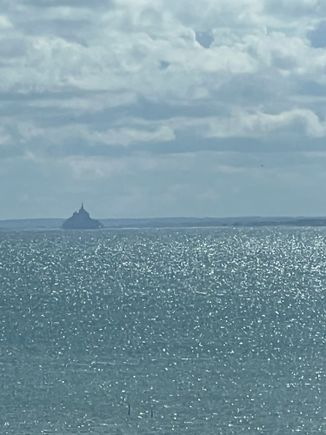 We can see a very tiny Mont St. Michel.