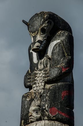 Bear-orca-salmon imagery.