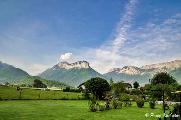 It was bright, sunny and cheerful morning. We had one of the best view from our villa itself. Lush green meadows, picturesque village, cows in the farms, majestic mountains all around. 