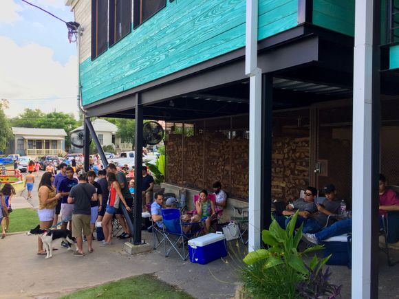 By 11am, the line of party goers stretched well beyond the area on the left. Never seen anything like that before until the very next morning when we waited 3 hours in line at another legendary Texas BBQ joint, Snows, where the 80-year-old female pitmaster is as nearly well regarded as Franklin. She works as a custodian at a nearby high school, so the restaurant is only open Saturday mornings until they run out, which they always do.