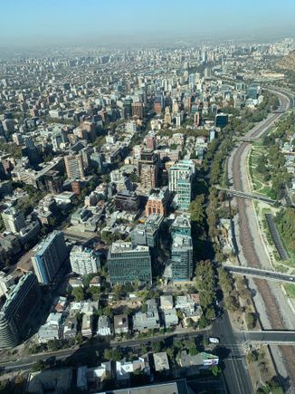 Great views of the city, although it was a very hazy due to smoke from fires. What is remarkable about the city planning in Santiago is that every street is lined with trees which you can easily see from the top of this building. Pretty impressive feat.