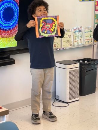 Art work from ripping paper and glue, no scissors allowed.