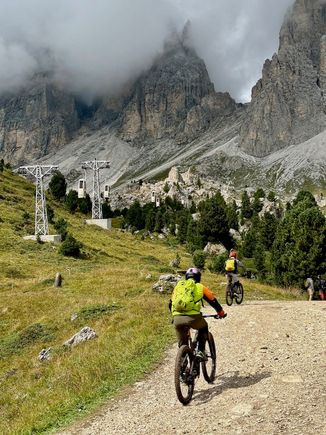Bikers under the telecabin lifts
