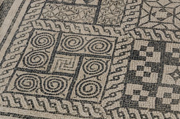 Warped floors spoke of the incredible power unleashed during the cataclysm---Mother Nature always bats last.