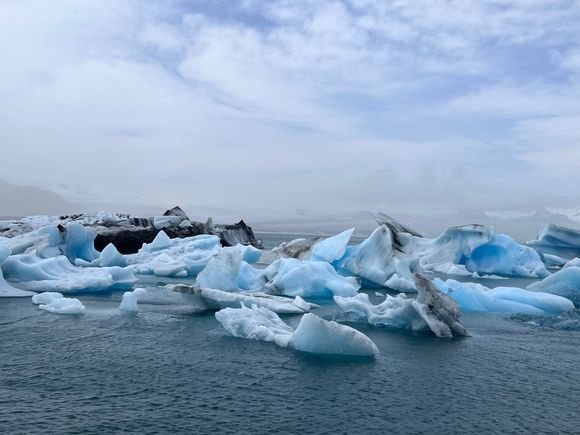 Icebergs floating out to sea in Jokulsarlon.