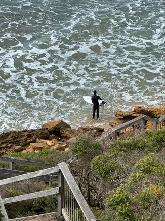 Surfer at Winki Pop Beach