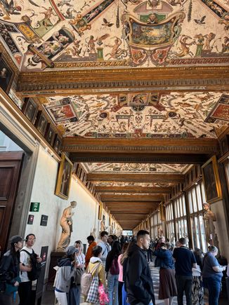 The elegant corridor of the Uffizi Gallery. the Uffizi contains the world's richest collection of Renaissance paintings and sculptures, including masterpieces by Botticelli, Raphael, Michelangelo, and Caravaggio.