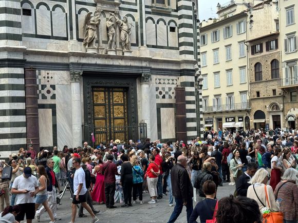 The exterior of the Baptistery. The doors are a replica. The original door is in the Museo to protect them from the elements. 