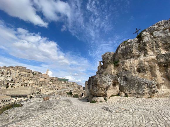 Chiesa di Santa Maria di Idris on the right with a wide view the sassi on the left