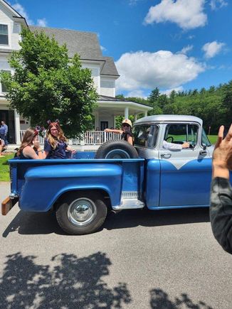 1956 GMC pu and grandkids tossing candy. 