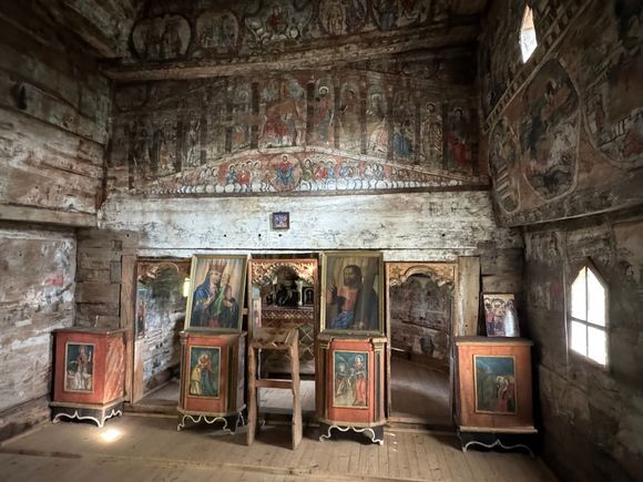 The interior of the church is filled with paintings