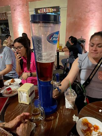 Happy dinners on the Calle 59. I don't  know how this device is filled, but I asked if I could take a picture and they said, sure.  Didn't offer me a beer though