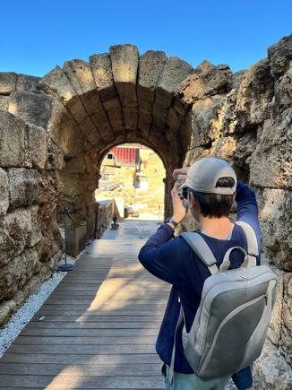 My son taking photos inside Roman Theater