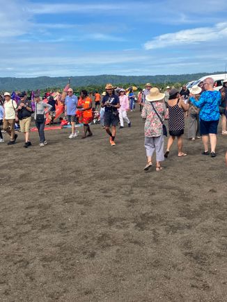 Tour groups at the hot springs.  Local market off to the side