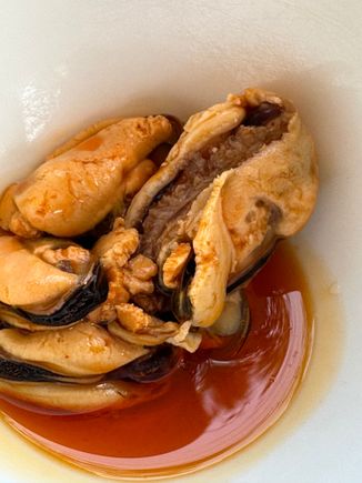 Complementary mussels in escabeche.. one of those dishes where you dab up every last bit off sauce with the bread..this was so delicious, and a bit spicy..this is mussel territory, after all....