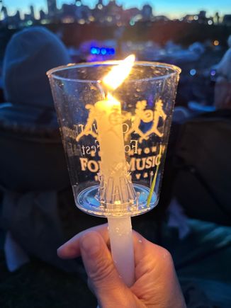 Love the candlelight tradition of passing the fire until the whole hill is lit by candles!