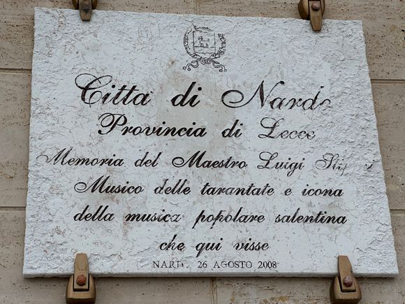 Plaque in the town at the former home of a Salentine tarantella musician