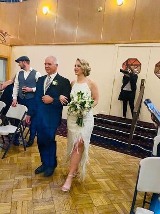 My dad and my sister, the bride. 