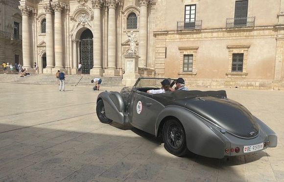 I realized I don't have a good photo of the Baroque facade - only in this photo of the arrival of one of about 30-40 attendees of the International Bugatti Meeting