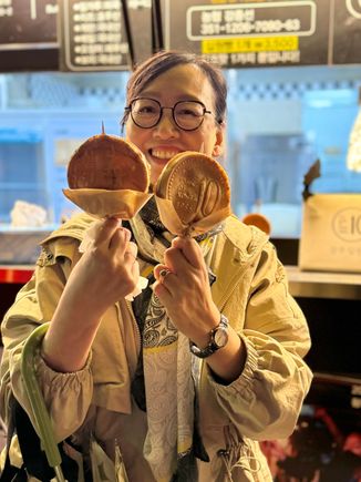 While working overtime, our guide bought us (sure glad we bought her lunch!) this local treat - cheese bread on a stick. Yummy!!!