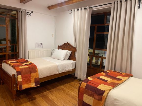 Our hotel room- simple, clean, roomy, and has a balcony with beautiful views 