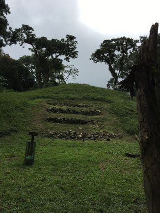 An ancient Lenca mound, with some stonework visible.