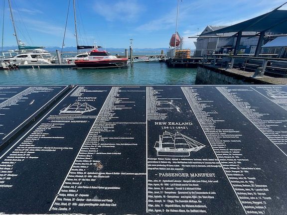 Plaques at the seafront with the names of immigrant ships and their manifests