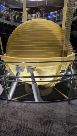 At the top of Taipei 101 is a very unique ball that takes out some of the sway.  That's not very engineering of me, but it's something look at.  It's a stabilizer, they have videos of it moving when there have been earthquakes.