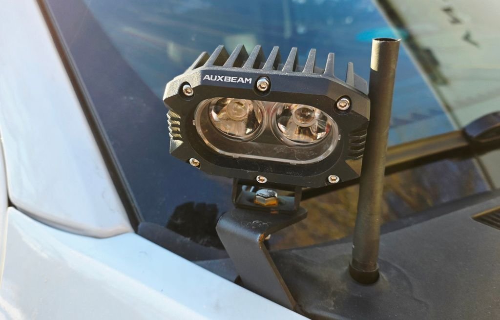 This is the left-hand light, showing the Nilight bracket, going down under the cowl...
