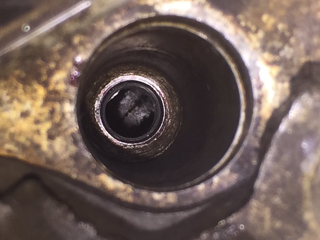 Ford spark plug ejection
