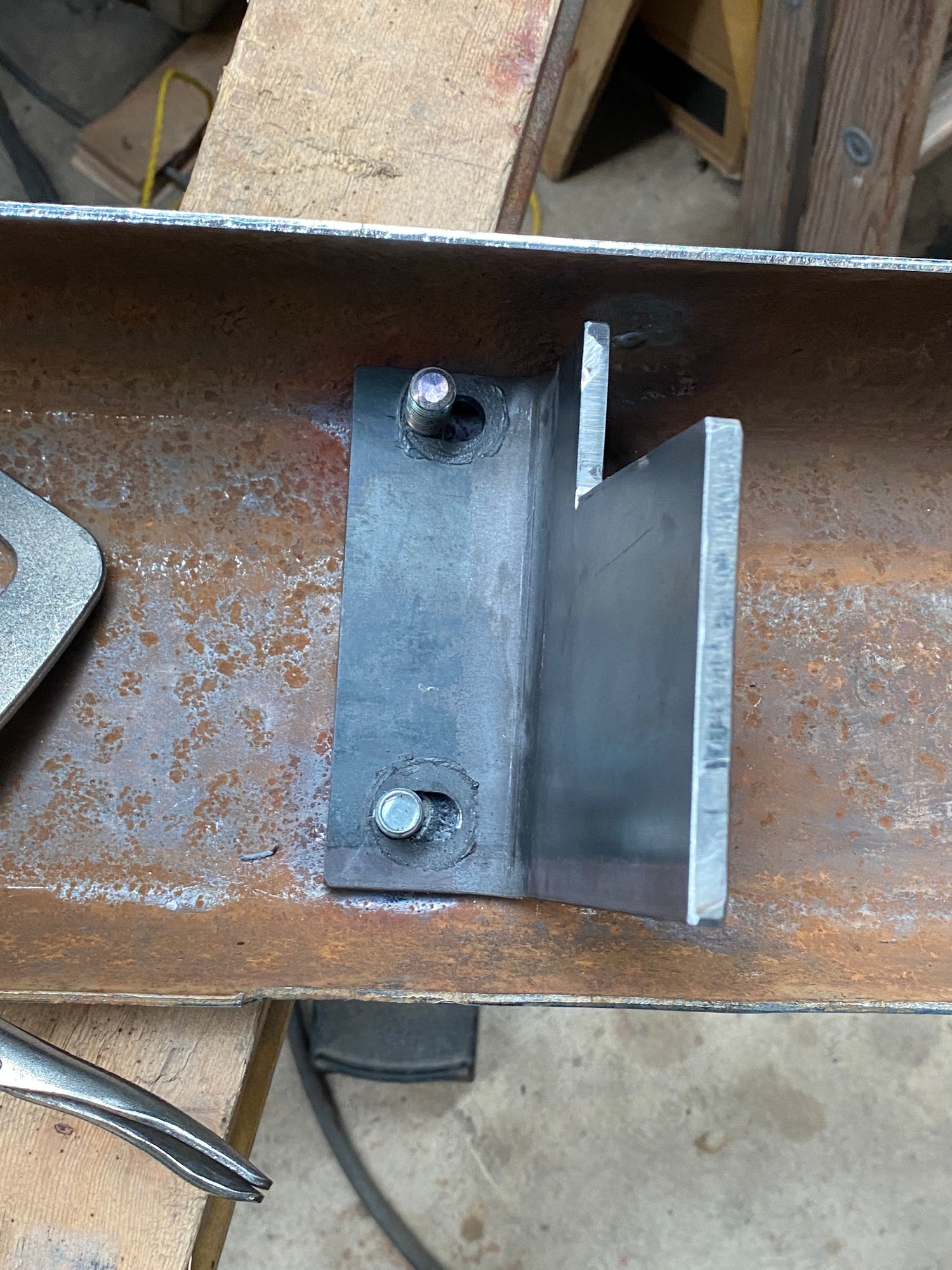 Mounting bracket shaped.