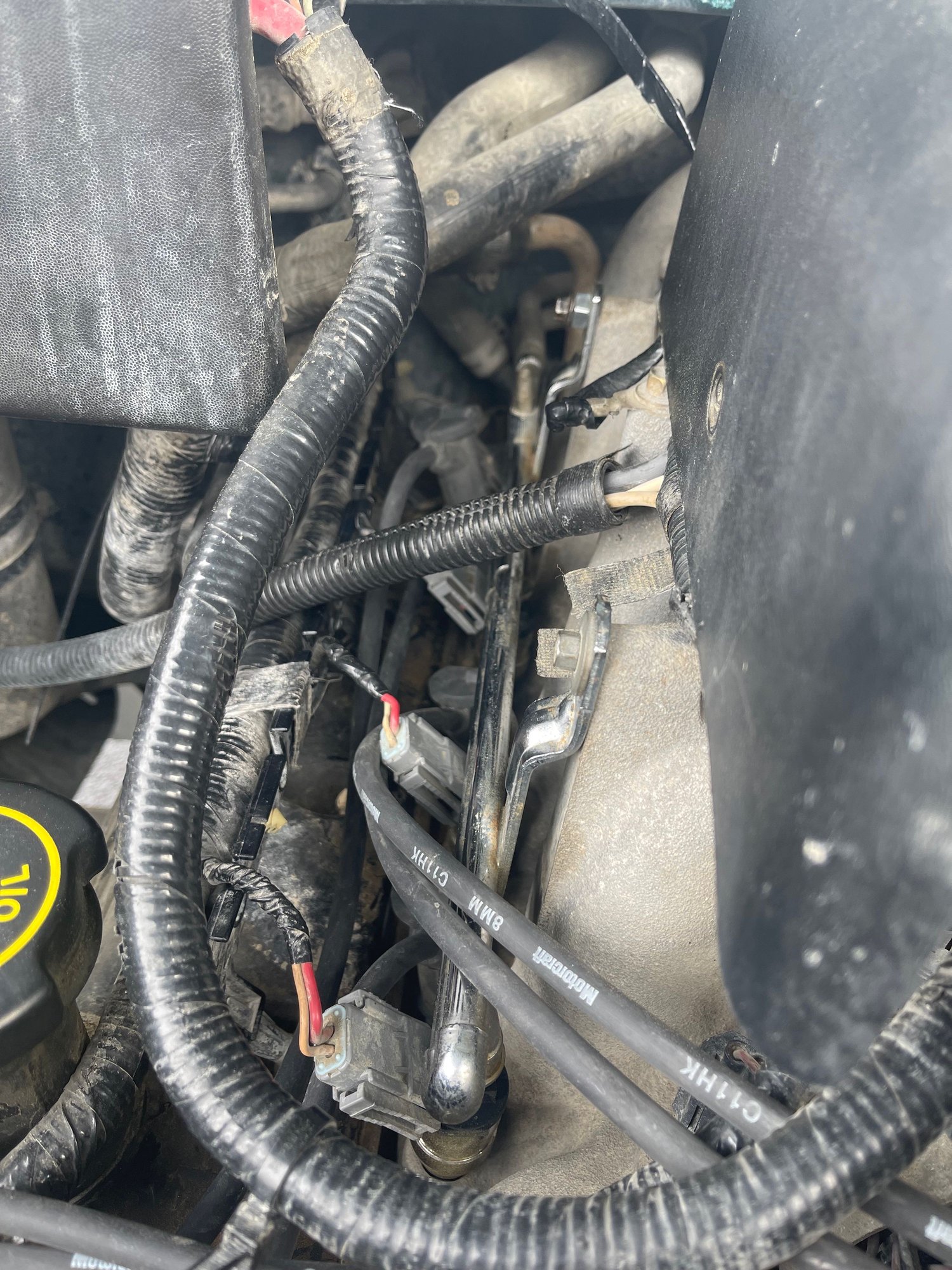 Spark Plug Wire keeps popping off while driving Ford Truck