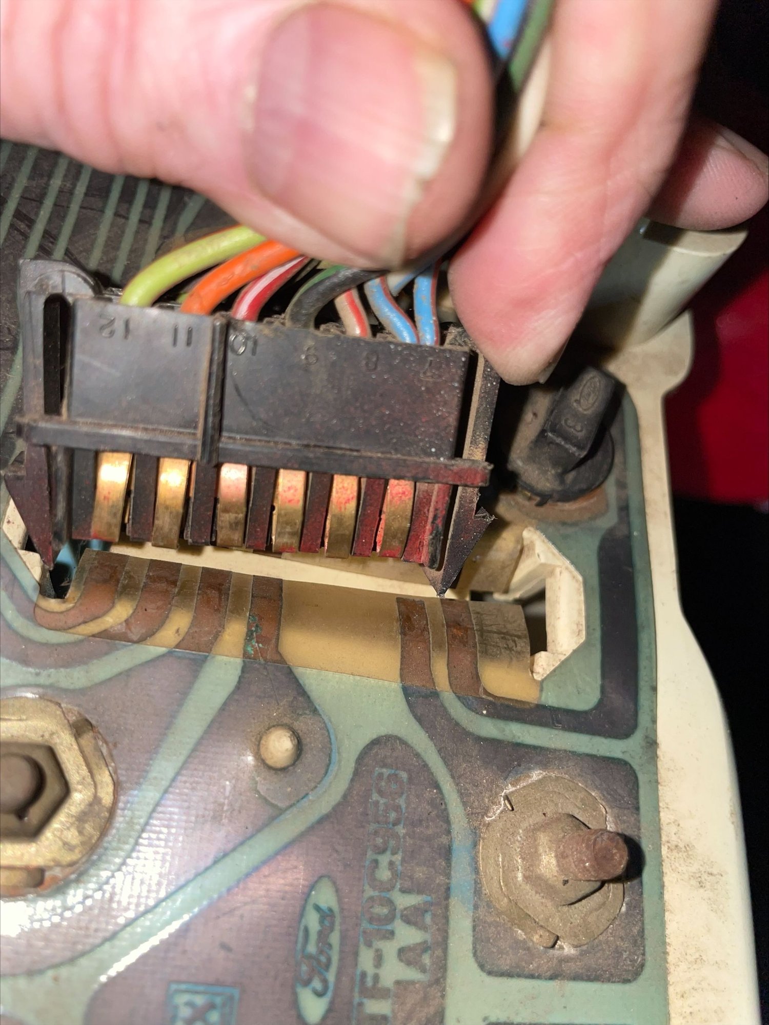 The female / slot in the back of the instrument cluster is larger / longer than the plug on the loom side.   