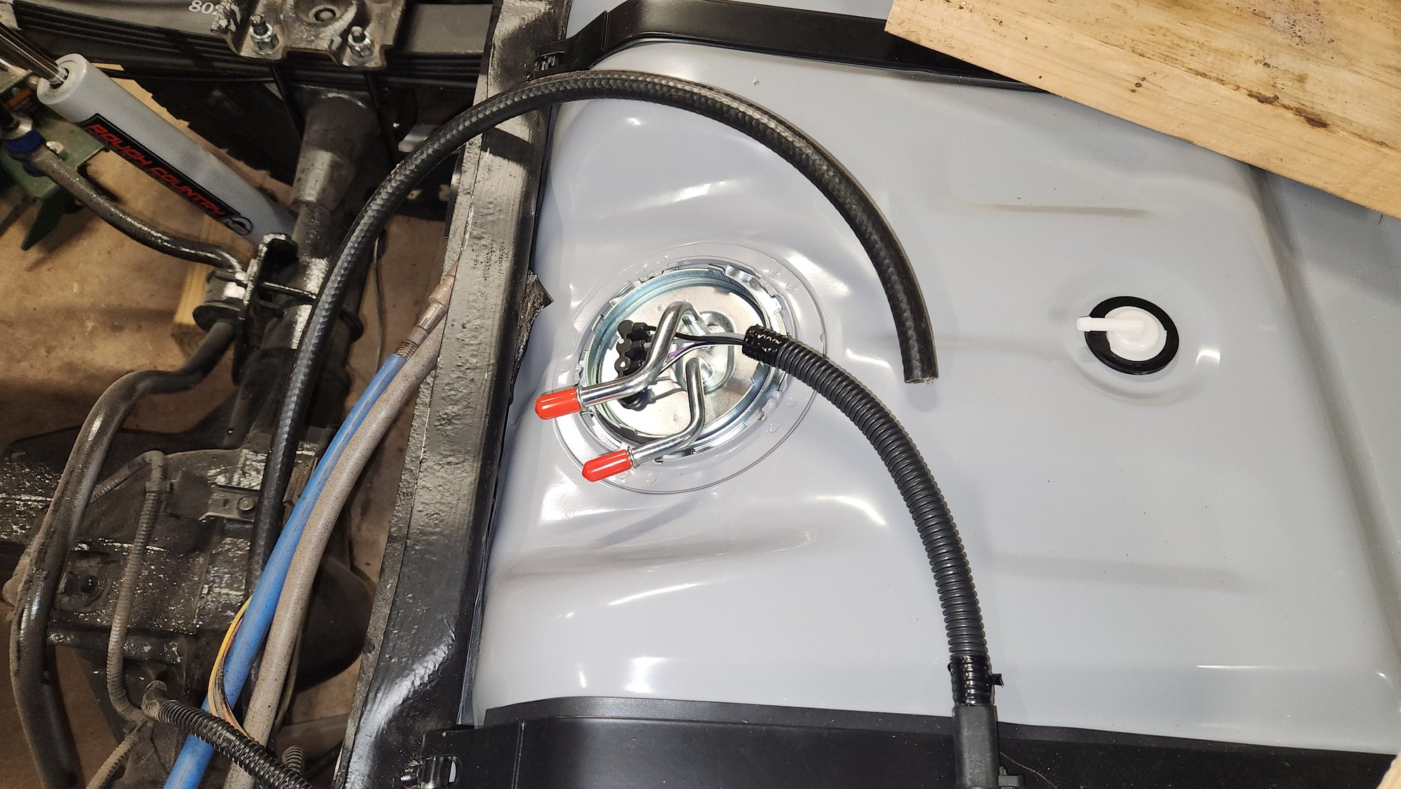 Rear tank with single port vent valve installed