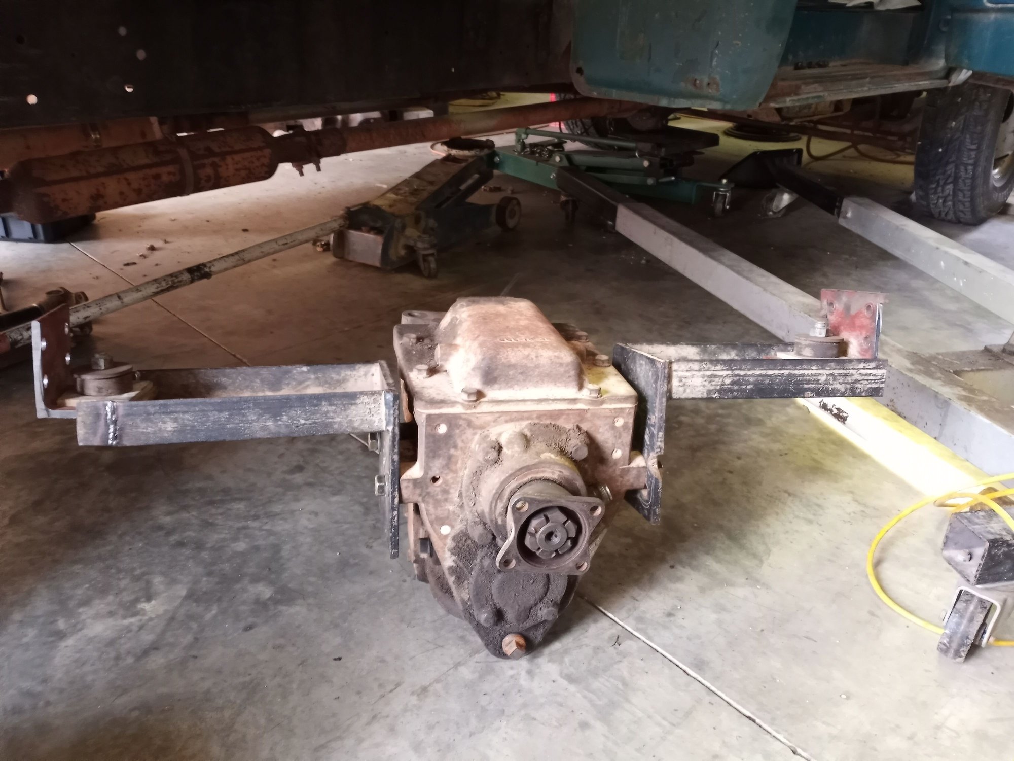 Rear mounts made from heavy plate and c-channel. The frame brackets have rubber isolators too.