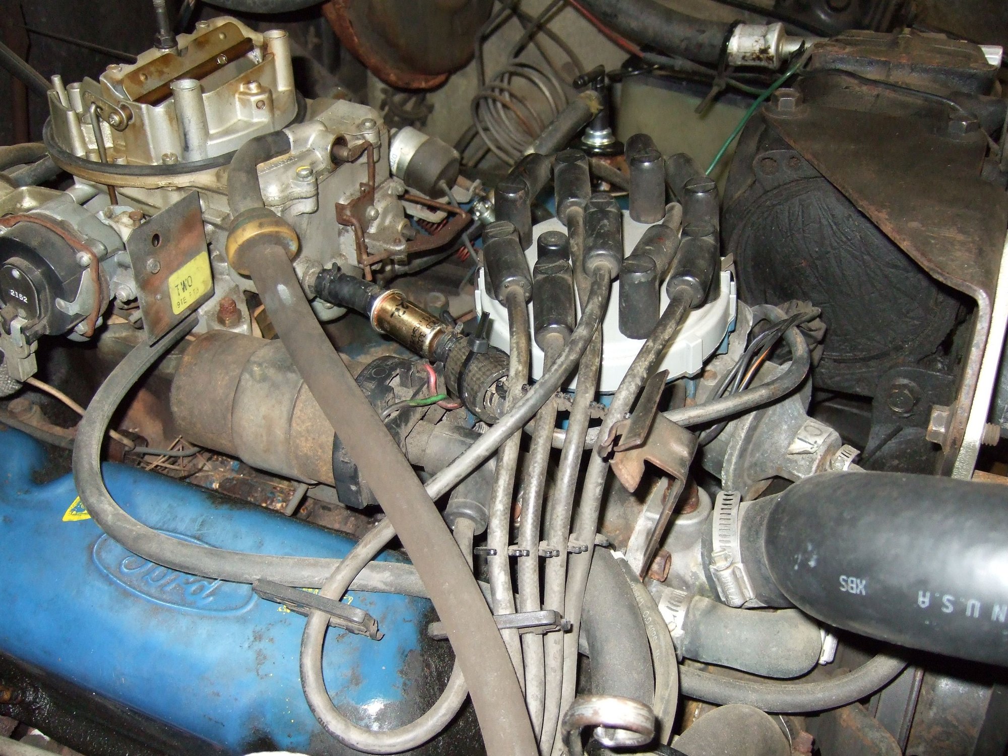 How to remove bottom thermostat housing bolt on 302 w/AC? Ford Truck