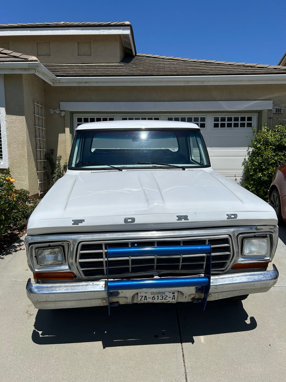 The front end has been changed out. I know that much. I want to change it back to the round headlights.