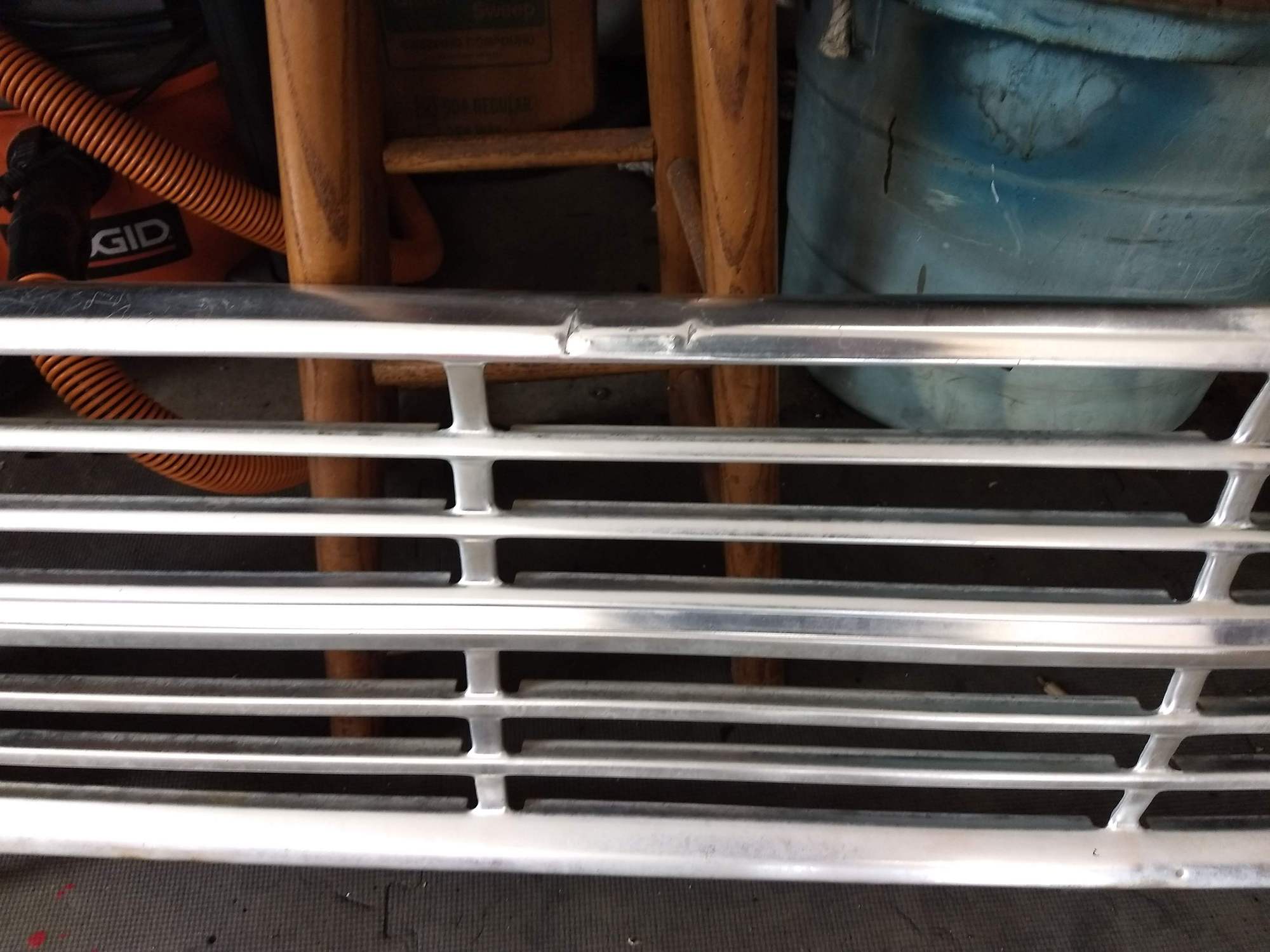 The grille even has a dent that lines up perfectly with the bumper dent.