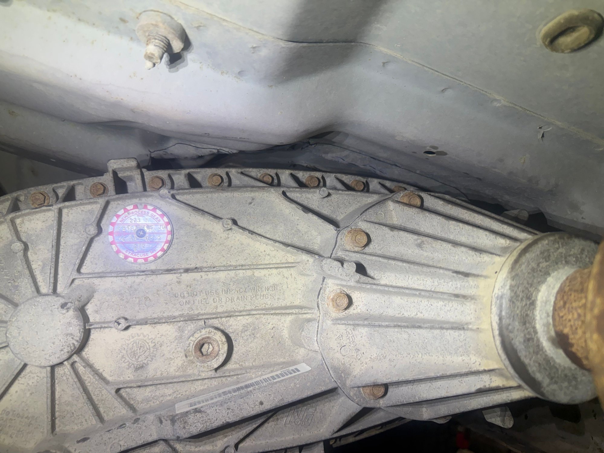 Made about an inch of clearance. Cut it out with a grinder and persuaded it with a sledge.