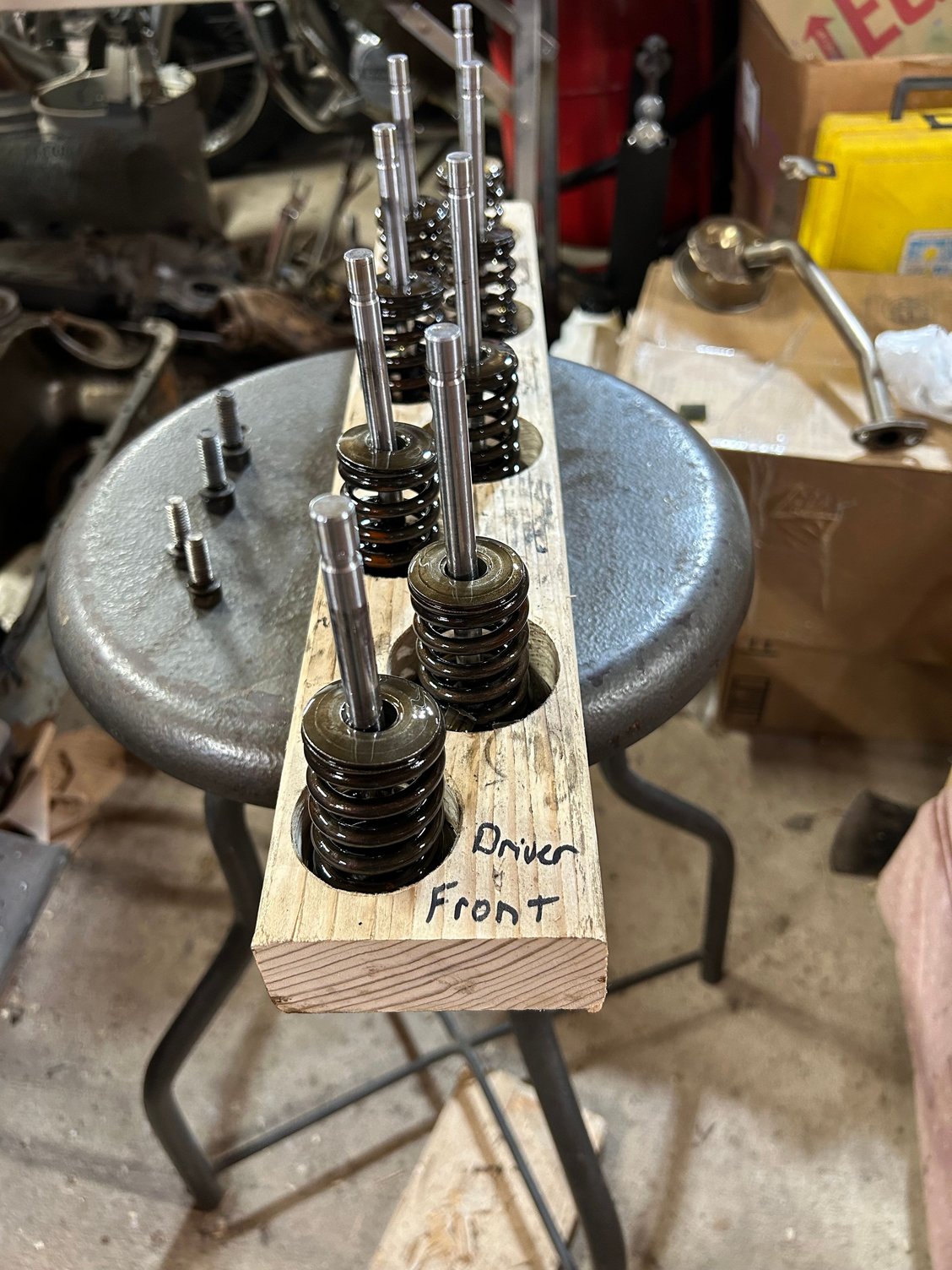 Got the first set done and cleaned up was getting ready to cover them with plastic bags to kind of keep the dirt and dust from getting on them after I cleaned and oiled them. Also, I had pulled The oil pump bolts and the pick up tube and ran them through the cycle of the ultrasonic cleaner. But the pick up tube had a pretty good coating of old kicked on oil so I cleaned it with gasoline first and it got quite a bit of it offand then ran it through the ultrasonic to kind of get cleaned inside the