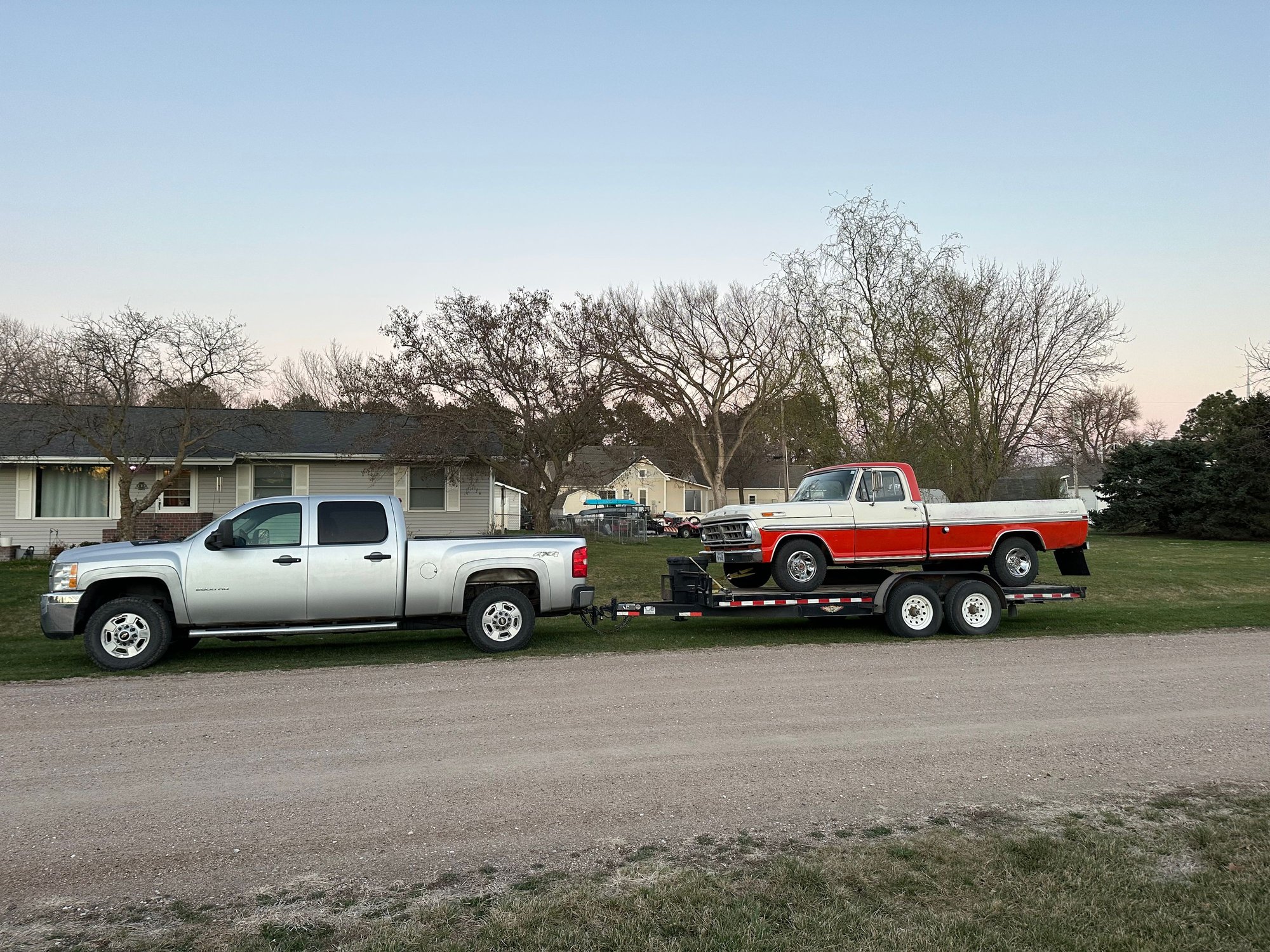  The nearly free trailer has come in handy here recently.  Hauling my truck, friends trucks, golf carts to an auction and a buddies tractor home from that auction.